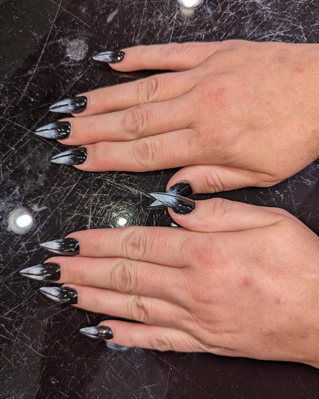 Black and silver stiletto nails