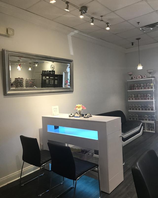 A manicure station with a blue glow