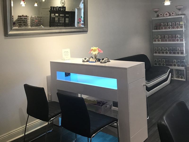 A station in the salon with a blue glow